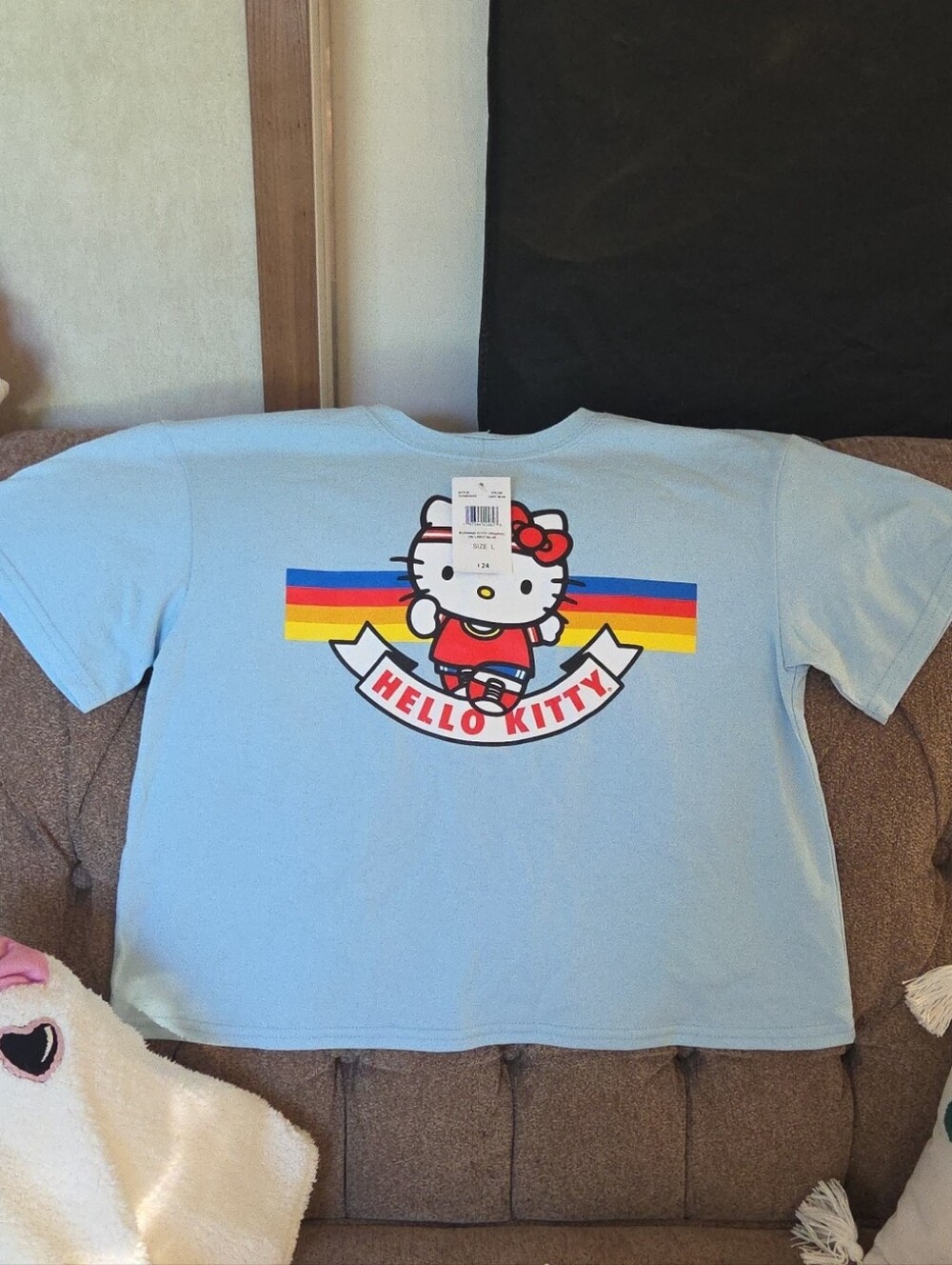 Hello Kitty Running Light Blue Tee with Retro Rainbow Stripe Graphic